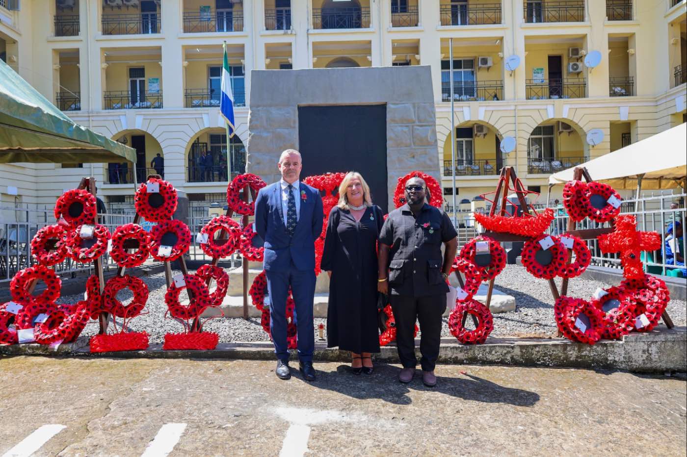 Remembrance Day wreaths at the Freetown cenotaph with CWGC representatives