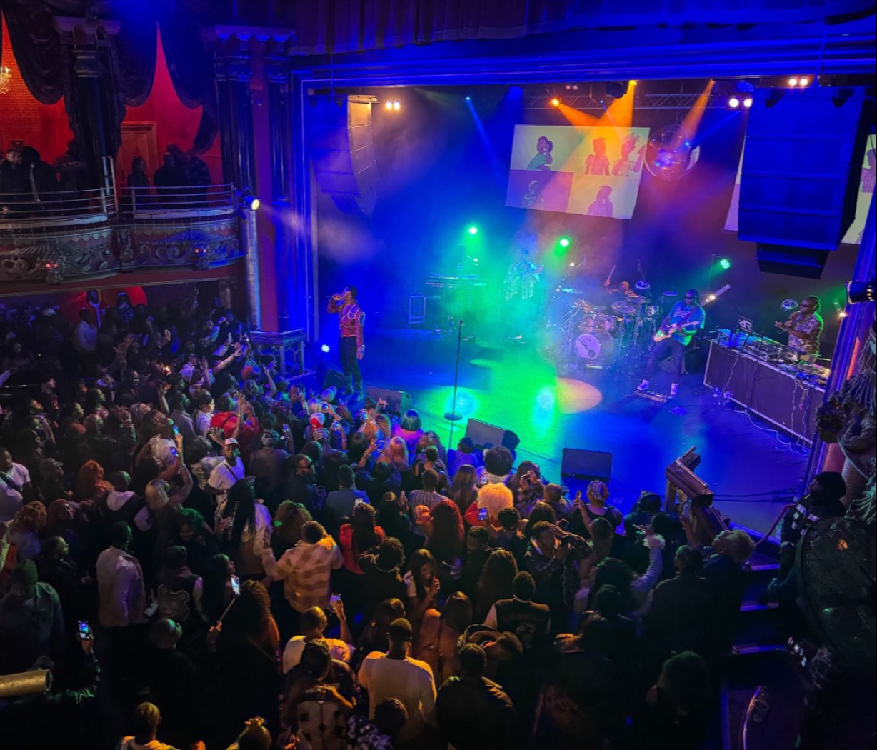 Drizilik and his band on stage at a packed Clapham Grand, London